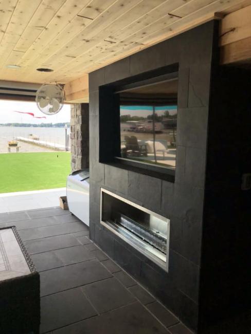 Outdoor TV Samsung Terrace in custom outdoor fireplace